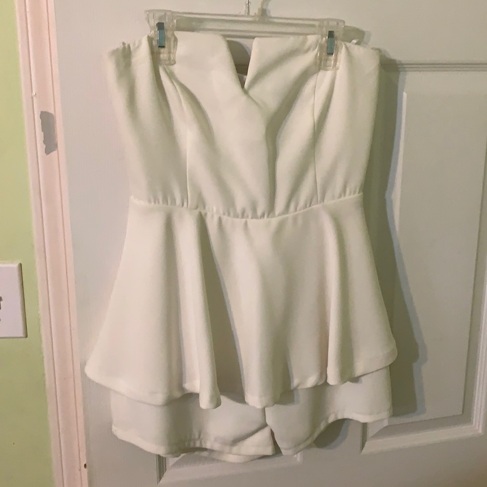 This is a white romper from lulu’s